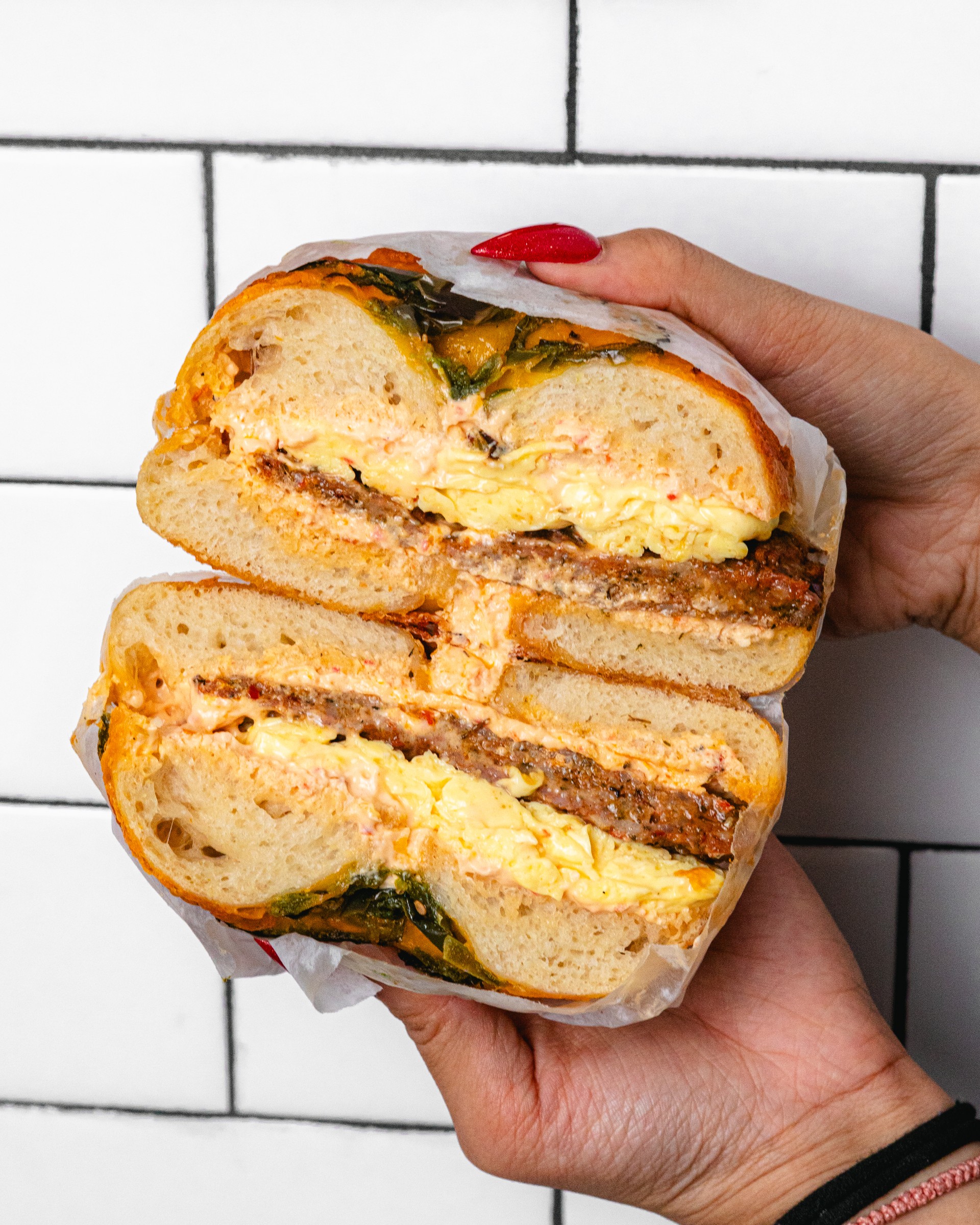 Feta Inferno bagel sandwich close-up